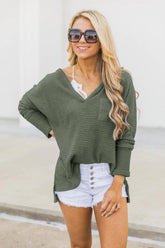 Camiseta corta con bolsillo y cuello en V